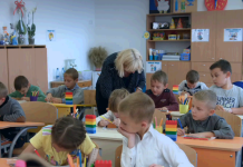 London schools to benefit from air filters in cleaner air initiative School teacher with children in classroom | Hillingdon Today