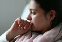 Domestic Abuse Spikes During World Cup A woman thinking deeply