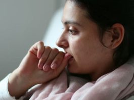 Domestic Abuse Spikes During World Cup A woman thinking deeply
