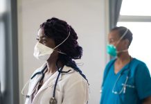 London Mayor Calls for Support Amid Rising Abuse of Frontline Workers Two doctors in a hospital