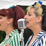 Mayor’s Picnic Comes to West Drayton Members of the Candy Girls sing at the 2025 Mayor's Picnic in the Park