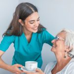 Council Plans New Care Homes and Affordable Housing Senior with carer