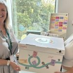 Council launches local Babybox scheme for new parents Cllr Susan O'Brien presents a Babybox