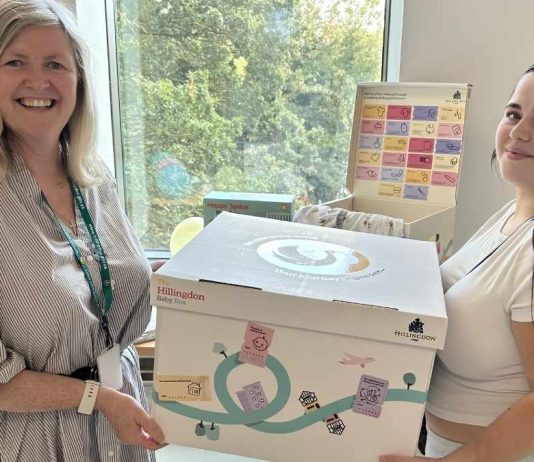 Council launches local Babybox scheme for new parents Cllr Susan O'Brien presents a Babybox